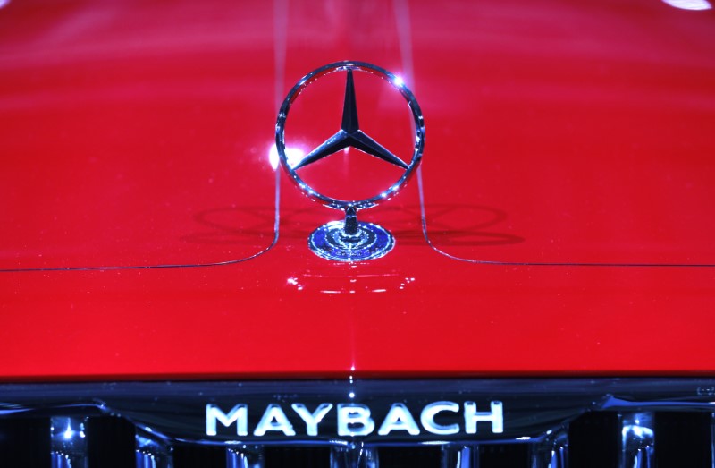 A Mercedes sign is seen on the Mercedes Maybach 6 car before the Daimler annual shareholder meeting in Berlin