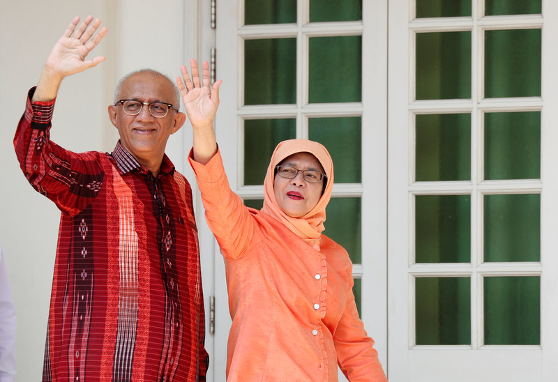 Former speaker of Singapore's parliament, Halimah Yacob, arrives to submit her presidential nomination papers at the nomination centre in Singapore