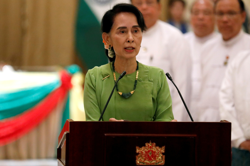 FILE PHOTO: Myanmar State Counselor Aung San Suu Kyi talks during a news conference with India's Prime Minister Narendra Modi in Naypyitaw