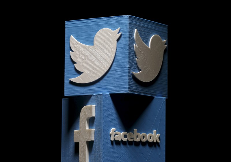 3D-printed Facebook and Twitter logos are seen in this picture illustration made in Zenica