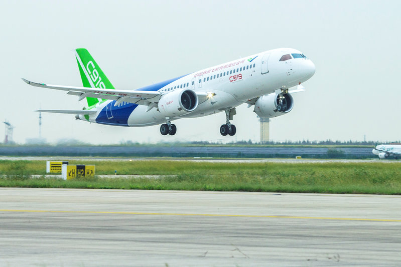 China's domestically developed C919 passenger jet takes off on its second test flight at Pudong International Airport in Shanghai