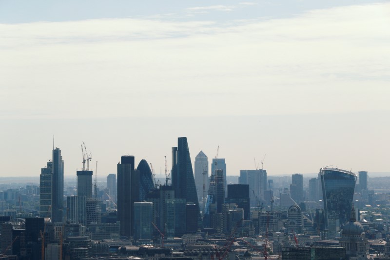 FILE PHOTO: A view of the City of London and Canary Wharf.