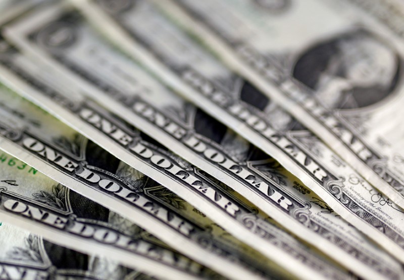 FILE PHOTO: U.S. dollar notes are seen in this picture illustration