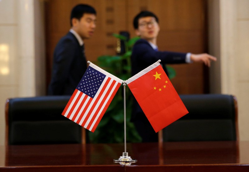 Chinese and U.S. flags are set up for a signing ceremony during a visit by U.S. Secretary of Transportation Elaine Chao at China's Ministry of Transport in Beijing,