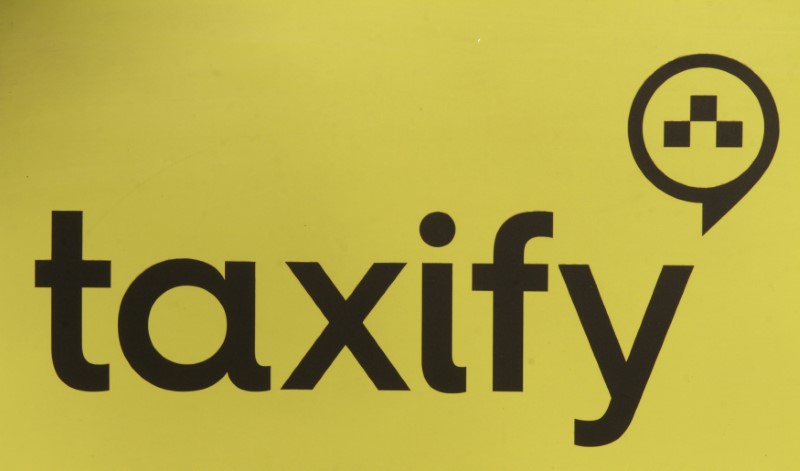 FILE PHOTO:Taxify logo is pictured on a taxi cab in Riga