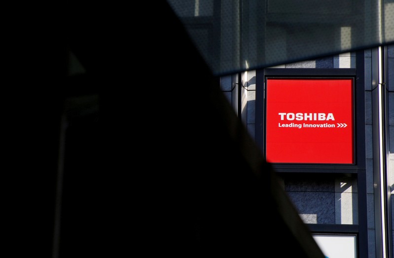 FILE PHOTO: A logo of Toshiba Corp is seen outside an electronics retail store in Tokyo