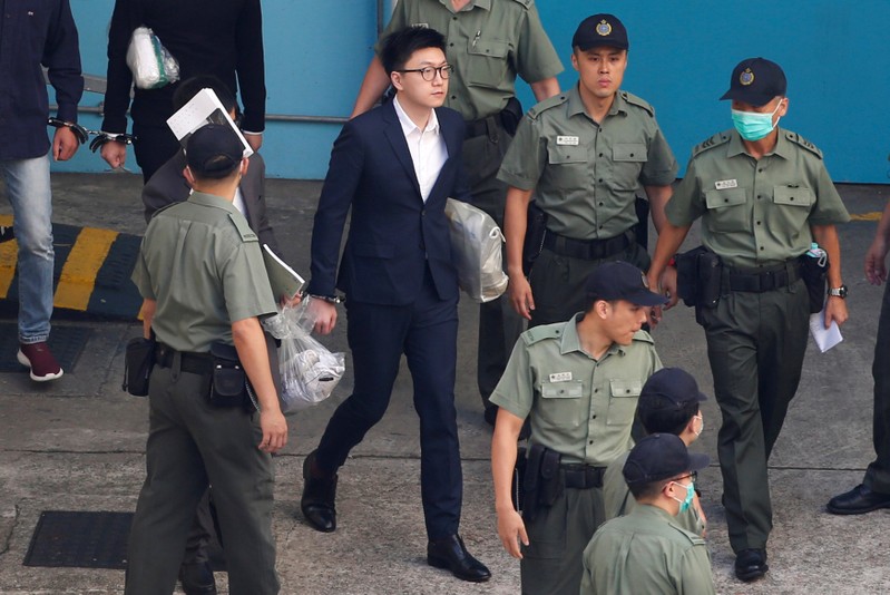 Pro-independence activist Edward Leung walks inside a detention centre in Hong Kong in Hong Kong