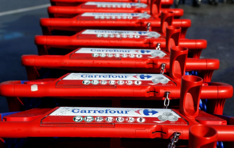 The logo of Carrefour is seen on shopping trolleys at the Carrefour Lingostiere in Nice