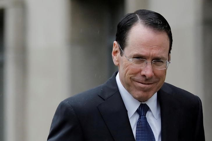 FILE PHOTO: Chief Executive Officer of AT&T Stephenson arrives at a U.S. District Court in Washington