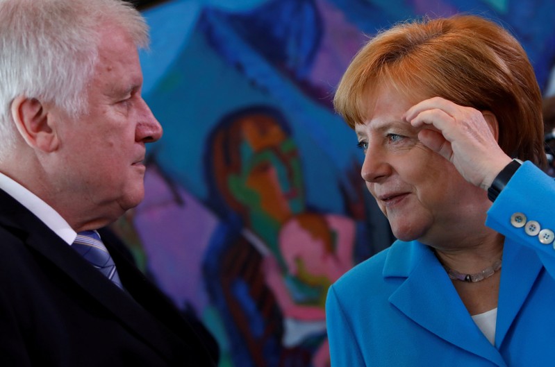 Merkel, allies avert collision for now in German migrant conflict