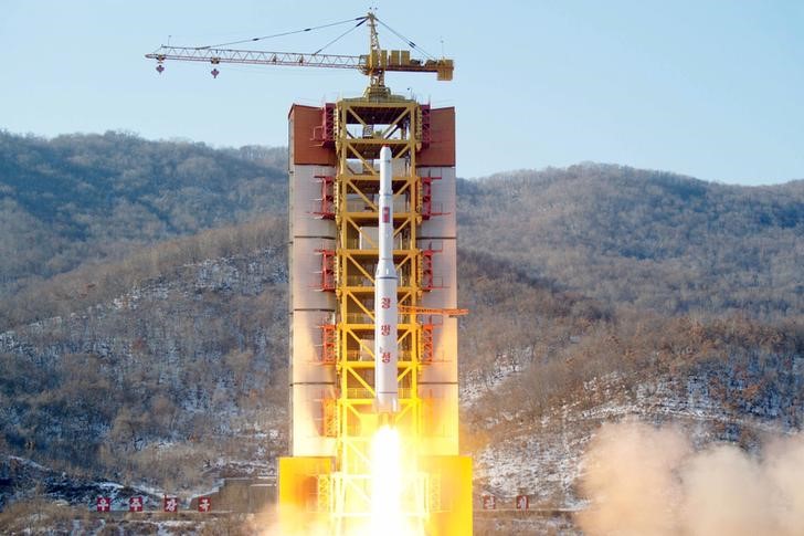FILE PHOTO: A North Korean long-range rocket is launched into the air at the Sohae rocket launch site, North Korea