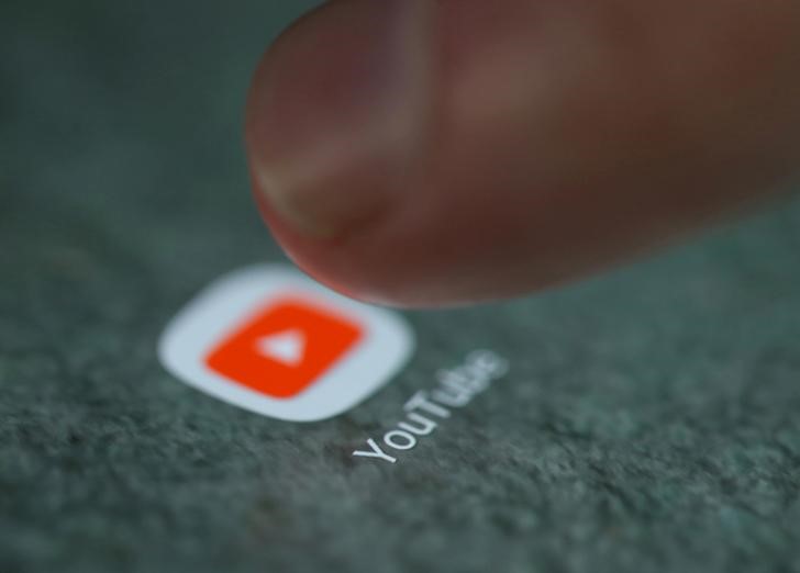 FILE PHOTO: The YouTube app logo is seen on a smartphone in this illustration