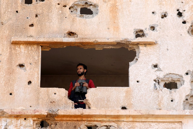 FILE PHOTO: A fighter from the Free Syrian Army is seen in Yadouda area in Deraa