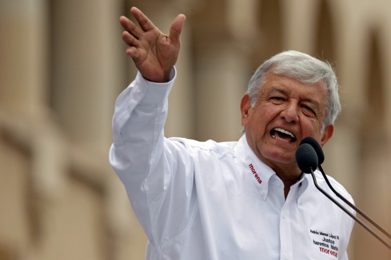 FILE PHOTO: Leftist front-runner Andres Manuel Lopez Obrador of MORENA gestures while addressing supporters during a campaign rally in Nuevo Laredo