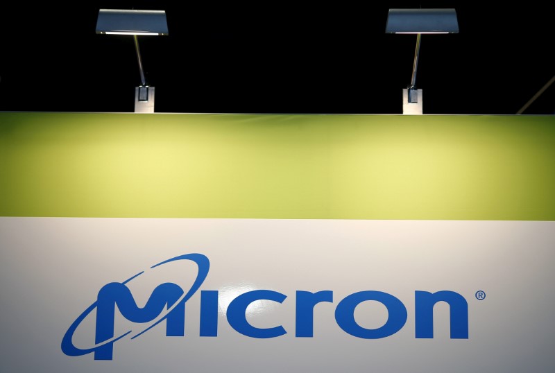 FILE PHOTO: FILE PHOTO: The logo of U.S. memory chip maker MicronTechnology is pictured at their booth at an industrial fair in Frankfurt