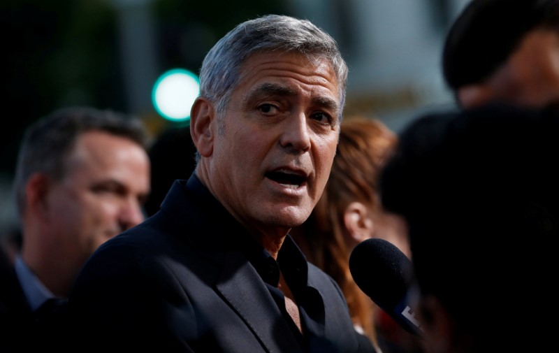 FILE PHOTO: Director Clooney is interviewed at the premiere for