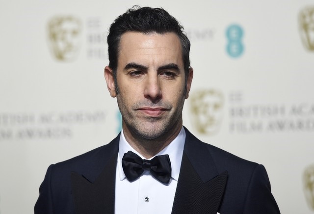 FILE PHOTO: Presenter Sacha Baron Cohen poses at the British Academy of Film and Television Arts (BAFTA) Awards at the Royal Opera House in London