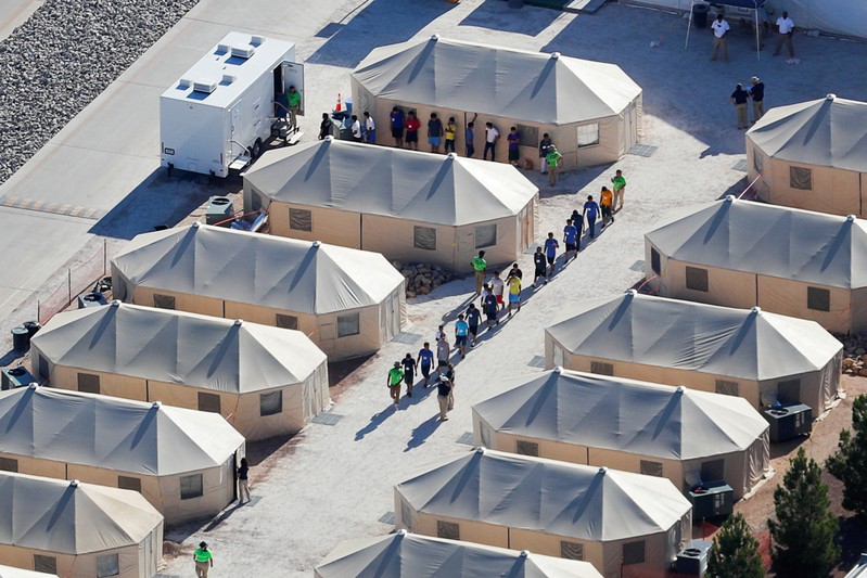 FILE PHOTO: Immigrant children now housed in a tent encampment under the new