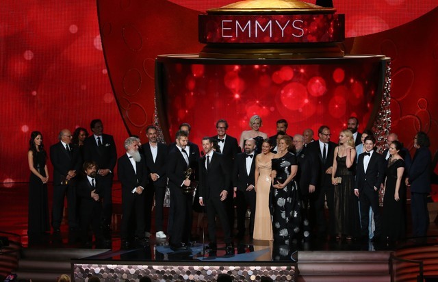 FILE PHOTO: Executive Producers Benioff and Weiss accept the award for Oustanding Drama Series with the cast and crew at the 68th Primetime Emmy Awards in Los Angeles