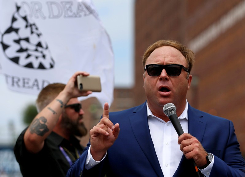 FILE PHOTO: Alex Jones from Infowars.com speaks during a rally in support of Republican presidential candidate Donald Trump near the Republican National Convention in Cleveland
