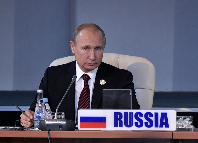 Russian President Putin attends a session of the BRICS summit in Johannesburg