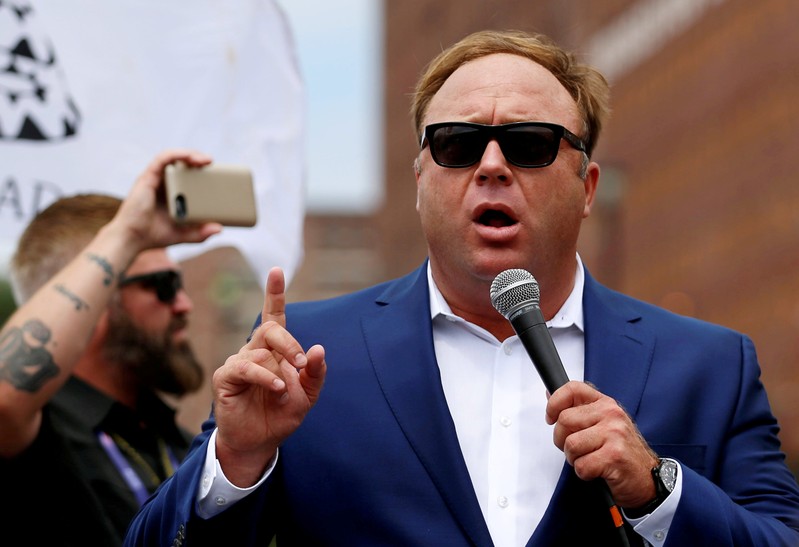 FILE PHOTO: Alex Jones from Infowars.com speaks during a rally in support of Republican presidential candidate Donald Trump near the Republican National Convention in Cleveland
