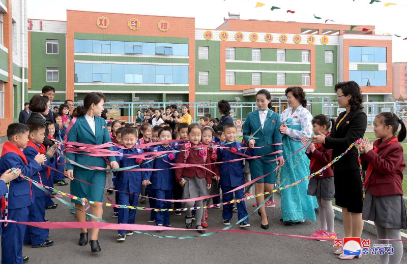 FILE PHOTO Students take part in a ceremony as the new school year begins in North Korea