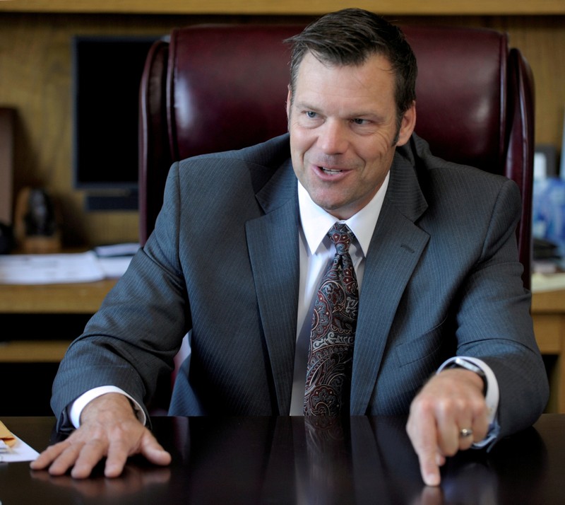 usbFILE PHOTO: Kansas Secretary of State Kobach talks about the Kansas voter ID law in his office in Topeka