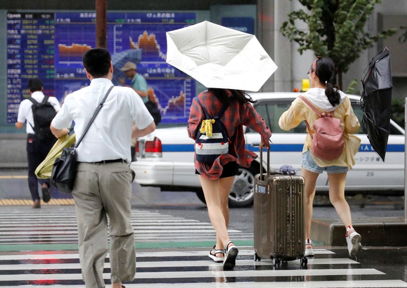 World shares fall for a fifth day on trade-war worries