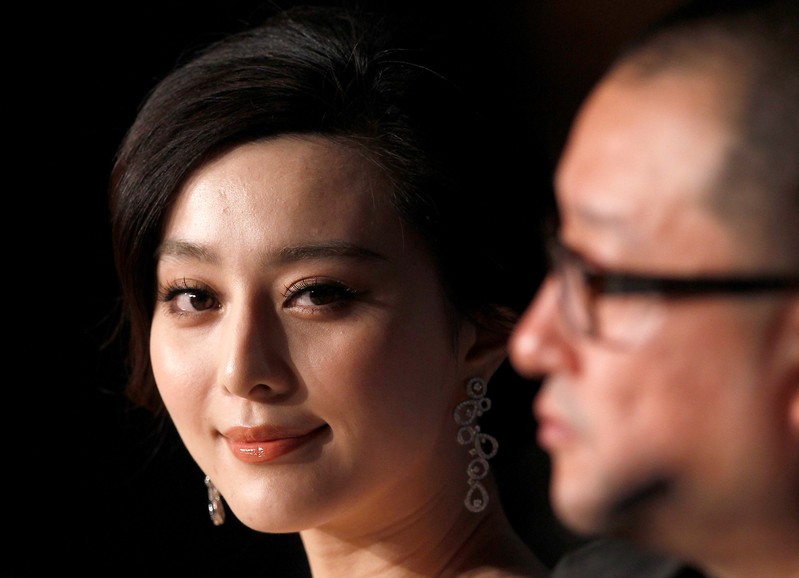 FILE PHOTO: Director Wang and cast member Fan attend a news conference for the film