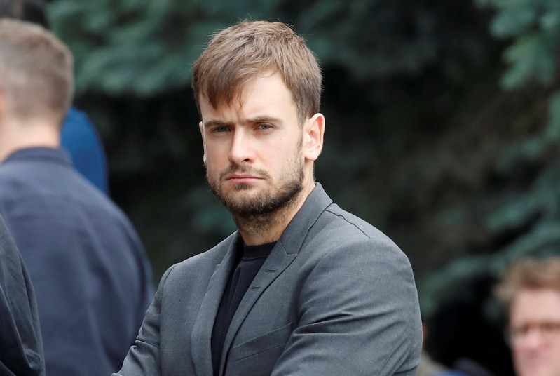 FILE PHOTO: Member of Russia's anti-Kremlin Voina art group Verzilov attends a funeral ceremony for Russian TV journalist Rastorguyev in Moscow