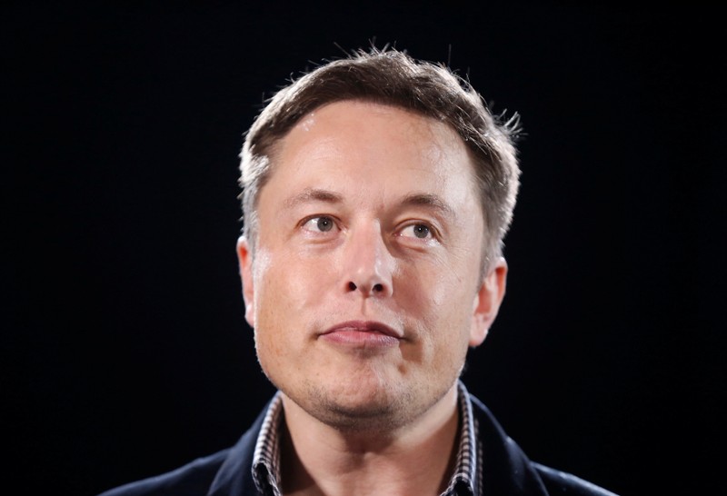 CEO Elon Musk unveils a new all-wheel-drive version of the Model S car in Hawthorne California