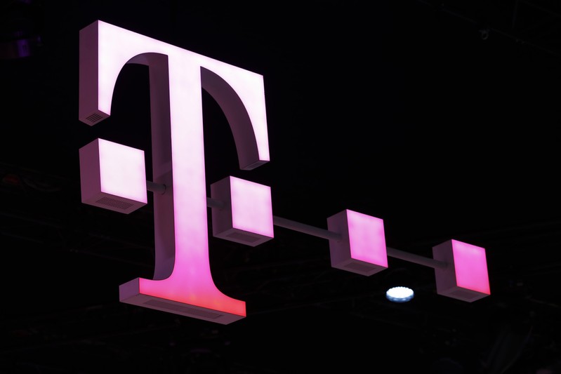 A Deutsche Telekom logo is seen at the Mobile World Congress in Barcelona