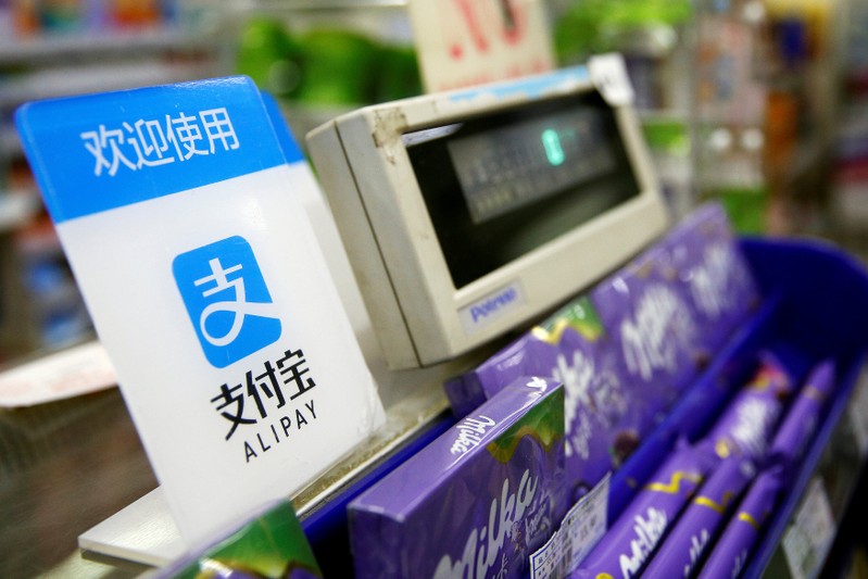FILE PHOTO: An Alipay logo is seen at a cashier in Shanghai