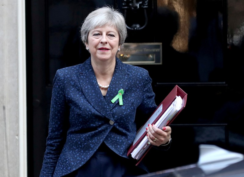 FILE PHOTO: Britain's Prime Minister Theresa May leaves Downing Street in London