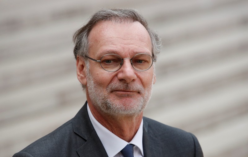 Accenture CEO Pierre Nanterme leaves after the