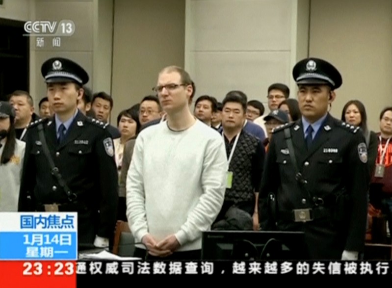 A still image taken from CCTV video shows Canadian Robert Lloyd Schellenberg in court where he was sentenced with a death penalty for drug smuggling in Dalian