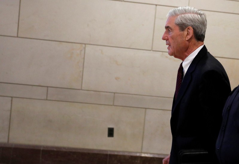 Mueller departs after briefing the U.S. House Intelligence Committee on Capitol Hill in Washington