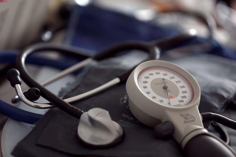 FILE PHOTO: A photo illustration shows a stethoscope and blood-pressure machine of a French general practitioner displayed in a doctor's office in Bordeaux