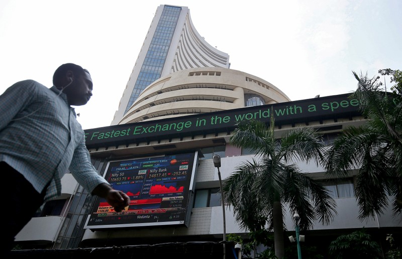 A man walks past the Bombay Stock Exchange (BSE) building in Mumbai