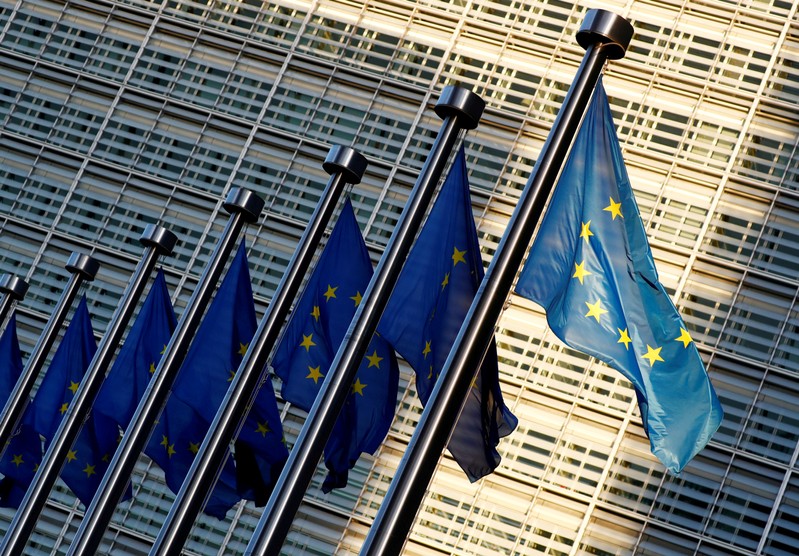 FILE PHOTO: EU flags outside the EU Commission headquarters in Brussels