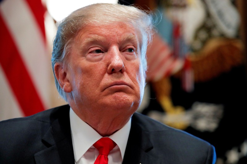 FILE PHOTO: U.S. President Trump listens during a meeting in the Cabinet Room of the White House in Washington