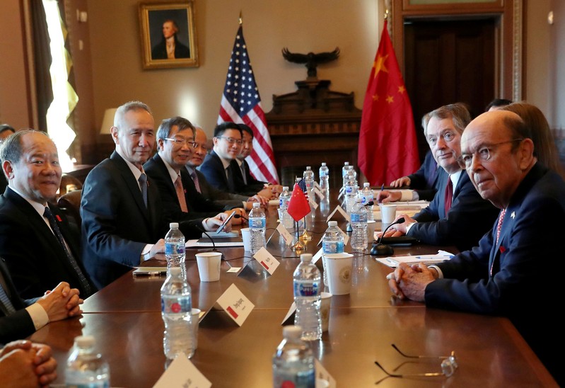 FILE PHOTO: U.S. trade representatives and White House advisers meet with a Chinese delegation led by China's Vice Premier Liu in the Diplomatic Room in the Eisenhower Executive Office Building on the White House campus in Washington