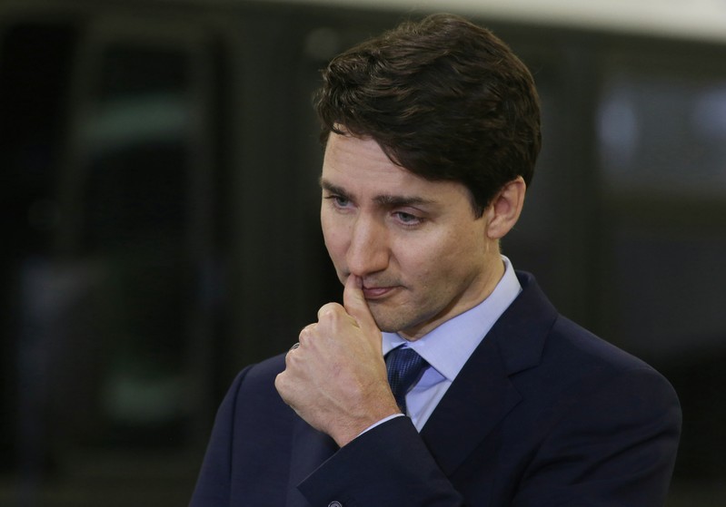 Canada's Prime Minister Justin Trudeau pauses during a visit to the Winnipeg Transit Fort Rouge Garage to make a transit infrastructure announcement in Winnipeg