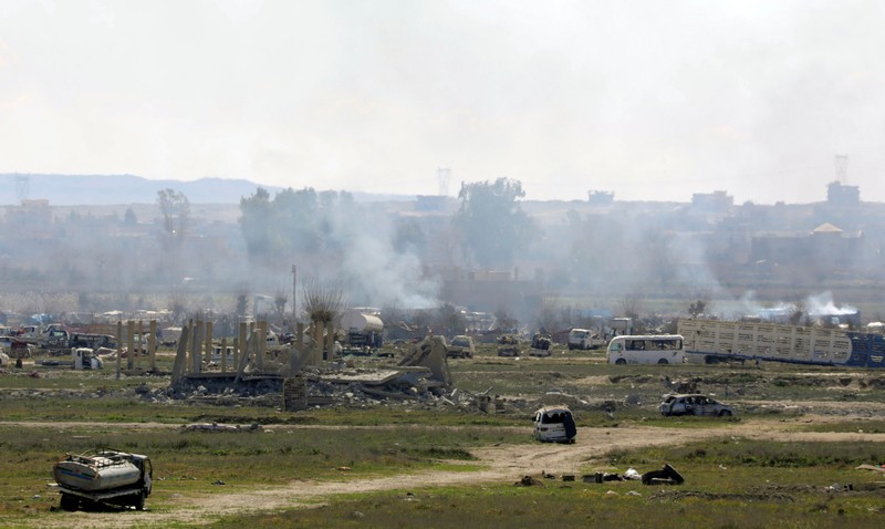 Plumes of smoke rise in Baghouz Deir Al Zor province