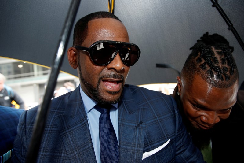 FILE PHOTO: Grammy-winning R&B star R. Kelly arrives for a child support hearing in Chicago