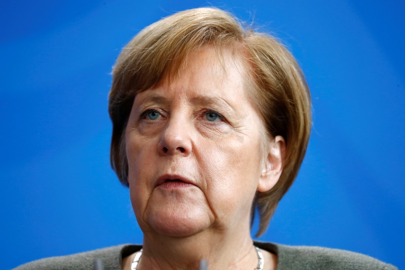 German Chancellor Angela Merkel attends a news conference at the Chancellery in Berlin