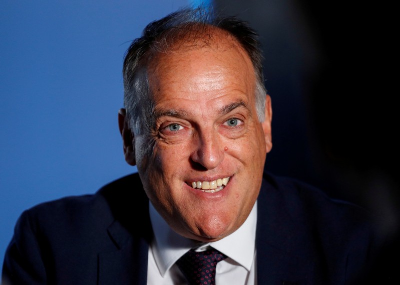 FILE PHOTO: La Liga President Javier Tebas smiles during an interview with Reuters at the La Liga headquarters in Madrid