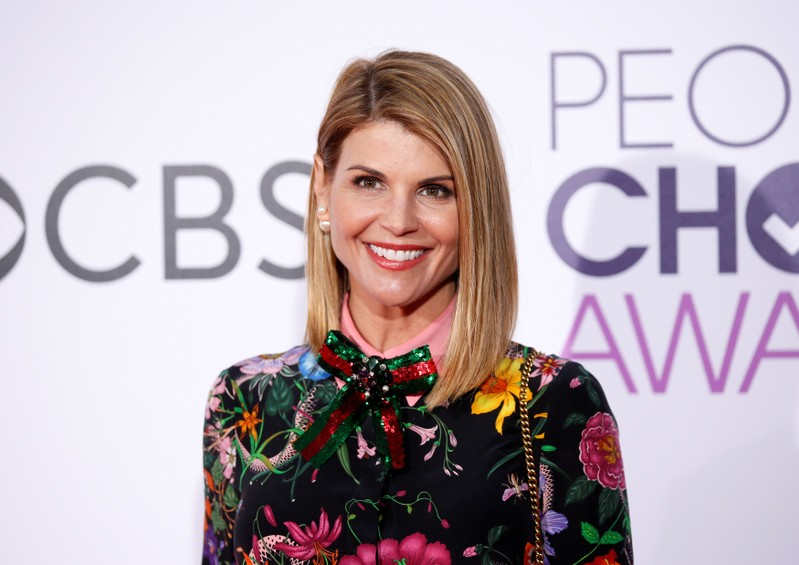 FILE PHOTO: Actress Lori Loughlin arrives at the People's Choice Awards 2017 in Los Angeles