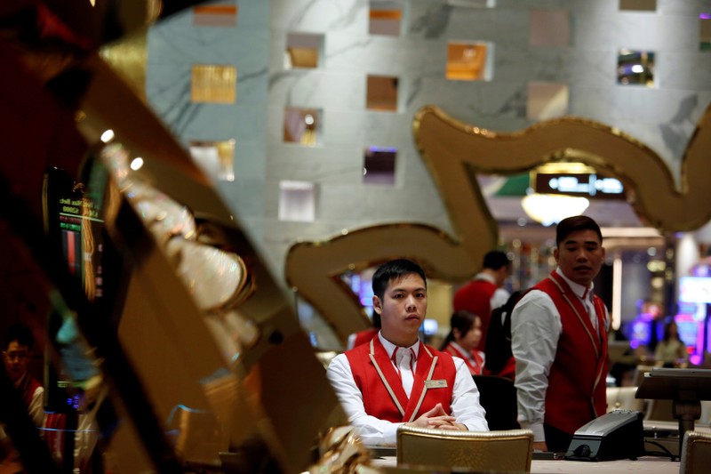 FILE PHOTO: Employees inside the casino prepare for the opening of MGM Cotai in Macau
